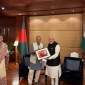 মোদিকে যে উপহার দিলেন ইউনূস